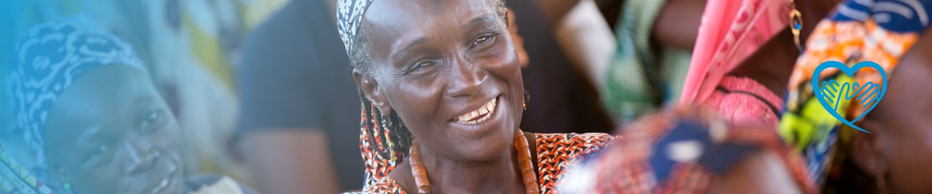 Afrikanische Frau lächelt glücklich - Für UN Women Projekte spenden
