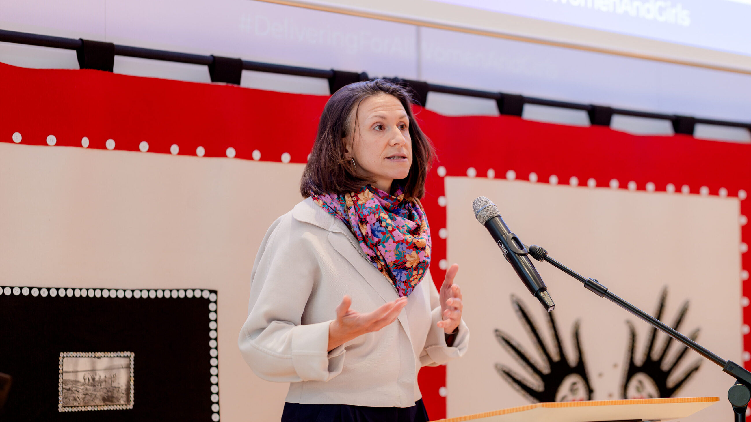 Lisi Maier on stage at the international conference presenting her welcoming remarks.