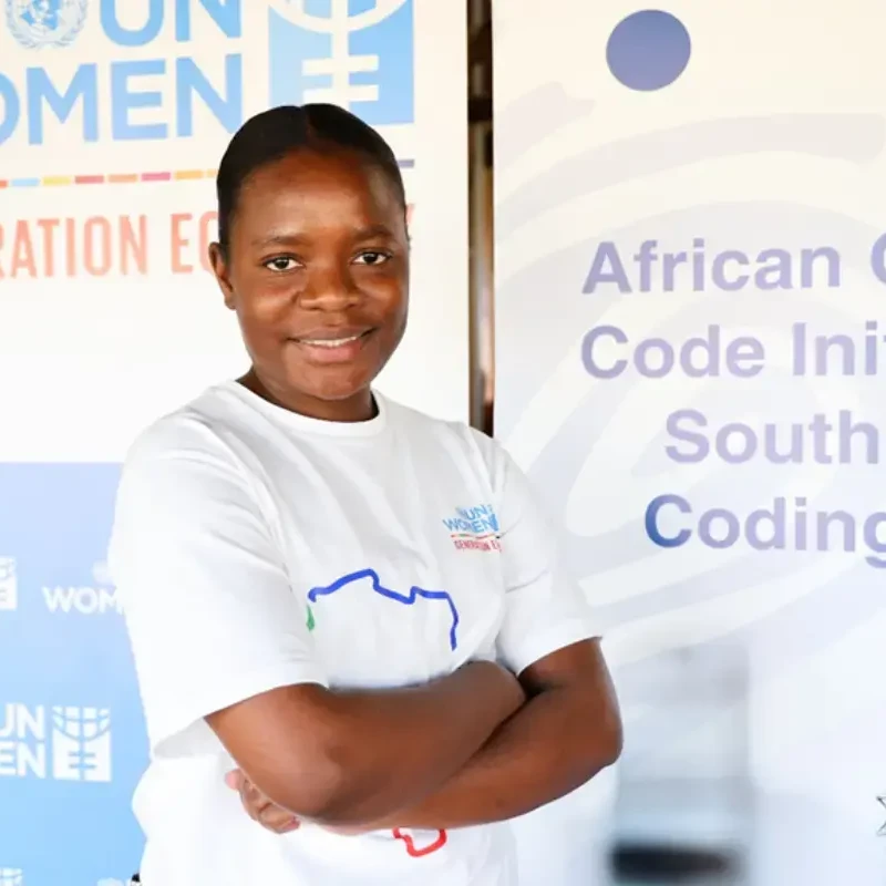 Mädchen vor Banner - - African Girls Can Code Initiative (AGCCI)